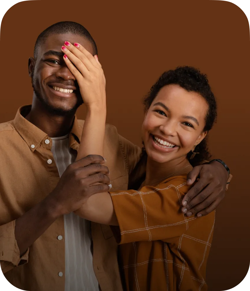 Smiling woman holding a phone, representing seamless money transfers